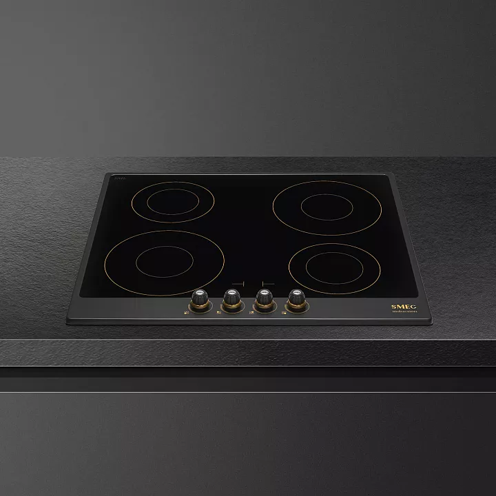 Индукционная варочная панель Smeg SI764AOM